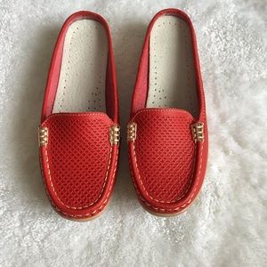 Orange leather mules